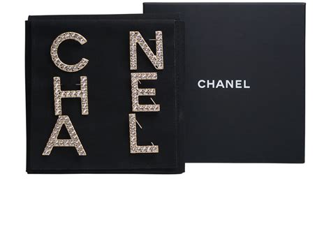 chanel brooch letters|Chanel brooches.